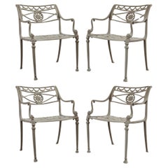 Set of Four Neoclassical Dolphin and Star Garden Dining Armchairs