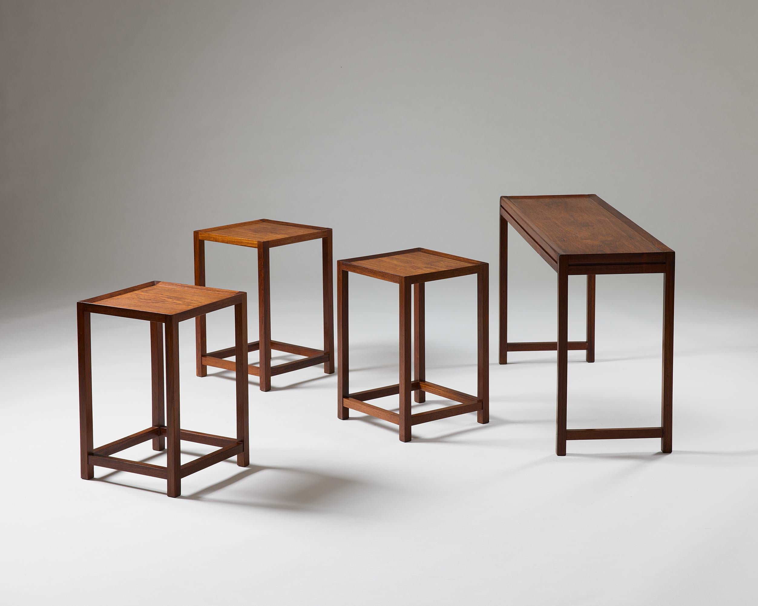 Rosewood Set of four nesting tables designed by Aksel Kjersgaard, Denmark, 1960s For Sale