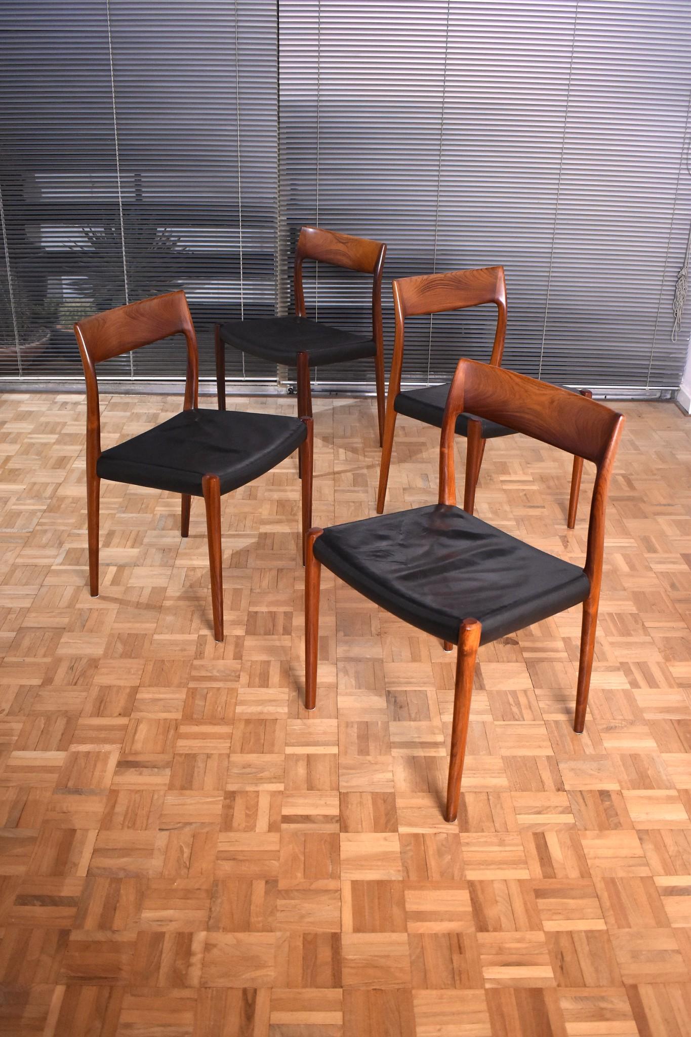 A stunning set of four Brazilian rosewood chairs designed in 1959 by Niels Moller for J.L Mollers Mobelfabrik.

These particular chairs still retain the original leather upholstery which has the most beautiful patina and character. We adore Moller