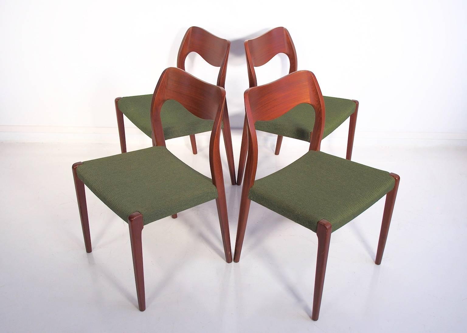 Danish solid teak dining chairs, model 71, by Niels Otto Møller for J. L. Møllers Møbelfabrik. Green wool seat upholstery. Designed in 1951.