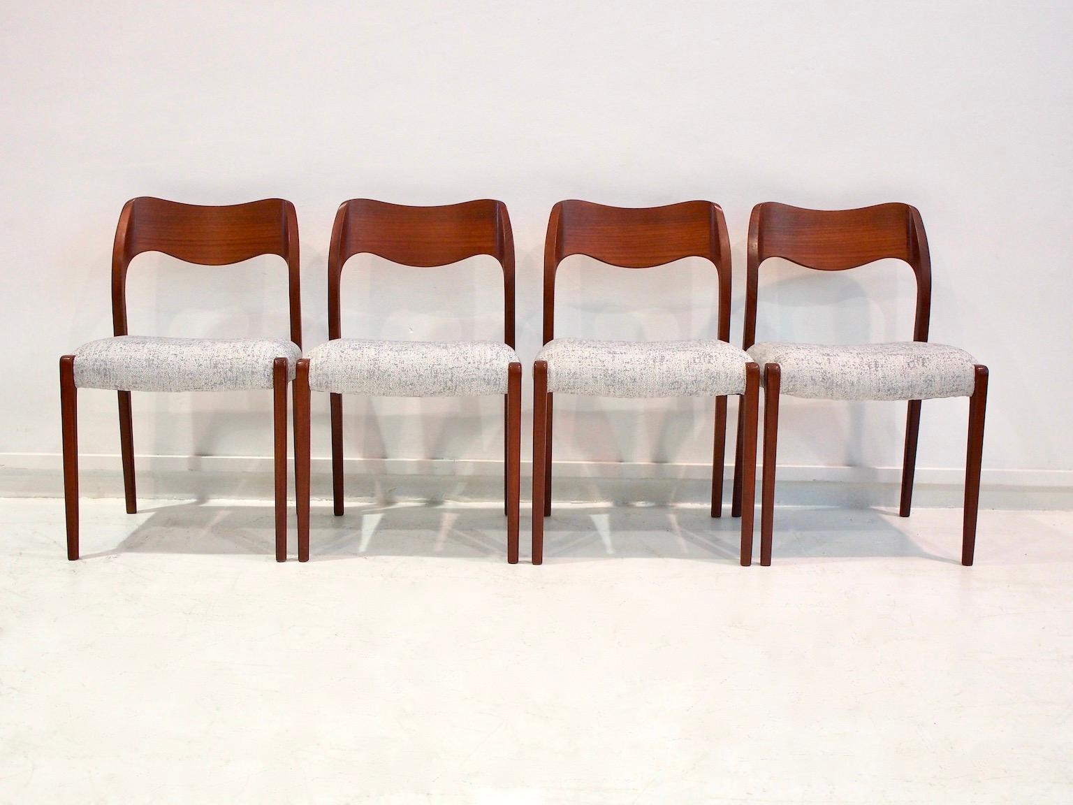 Danish solid teak dining chairs, model 71, by Niels Otto Møller for J. L. Møllers Møbelfabrik. Designed in 1951. Recently restored and reupholstered in light grey fabric.