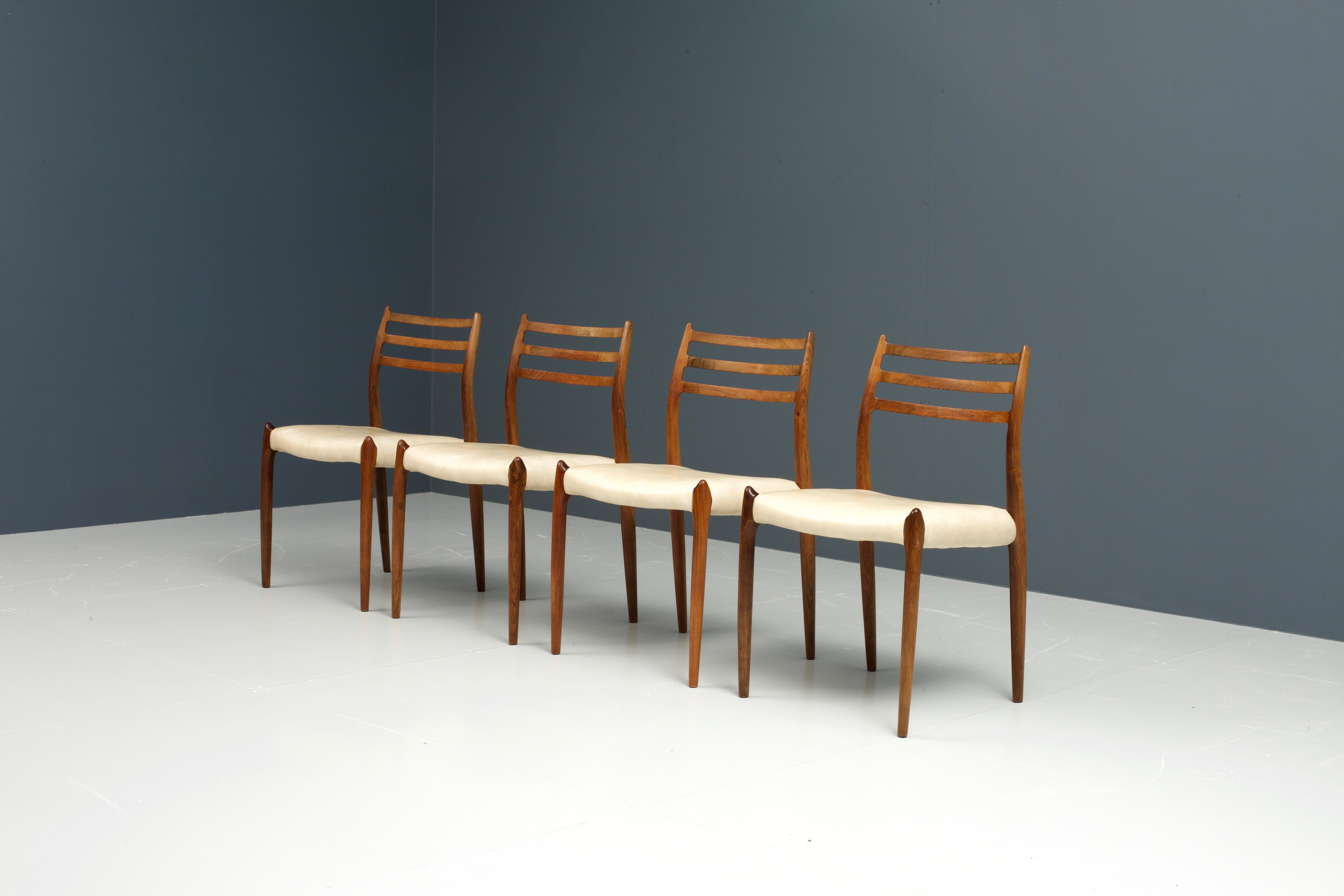 Set of four Classic Niels Otto Møller chairs number 78 in rosewood. 

This is a true Danish design Classic with it's characteristic knees that point out and really invite your hands to be placed on top of them. Also it's little horns at the top of