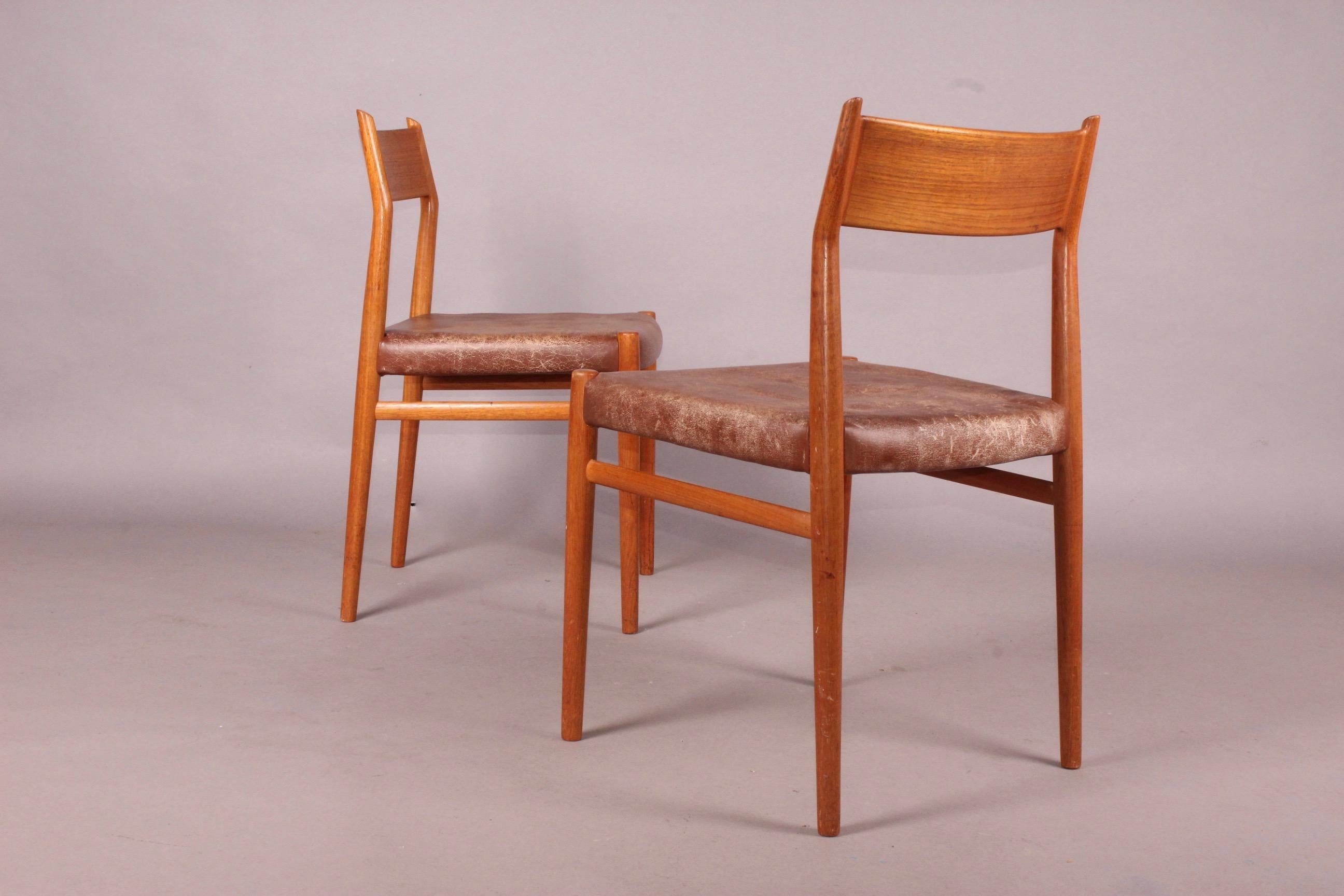 Set of four nordic chairs, old patina on the leather.