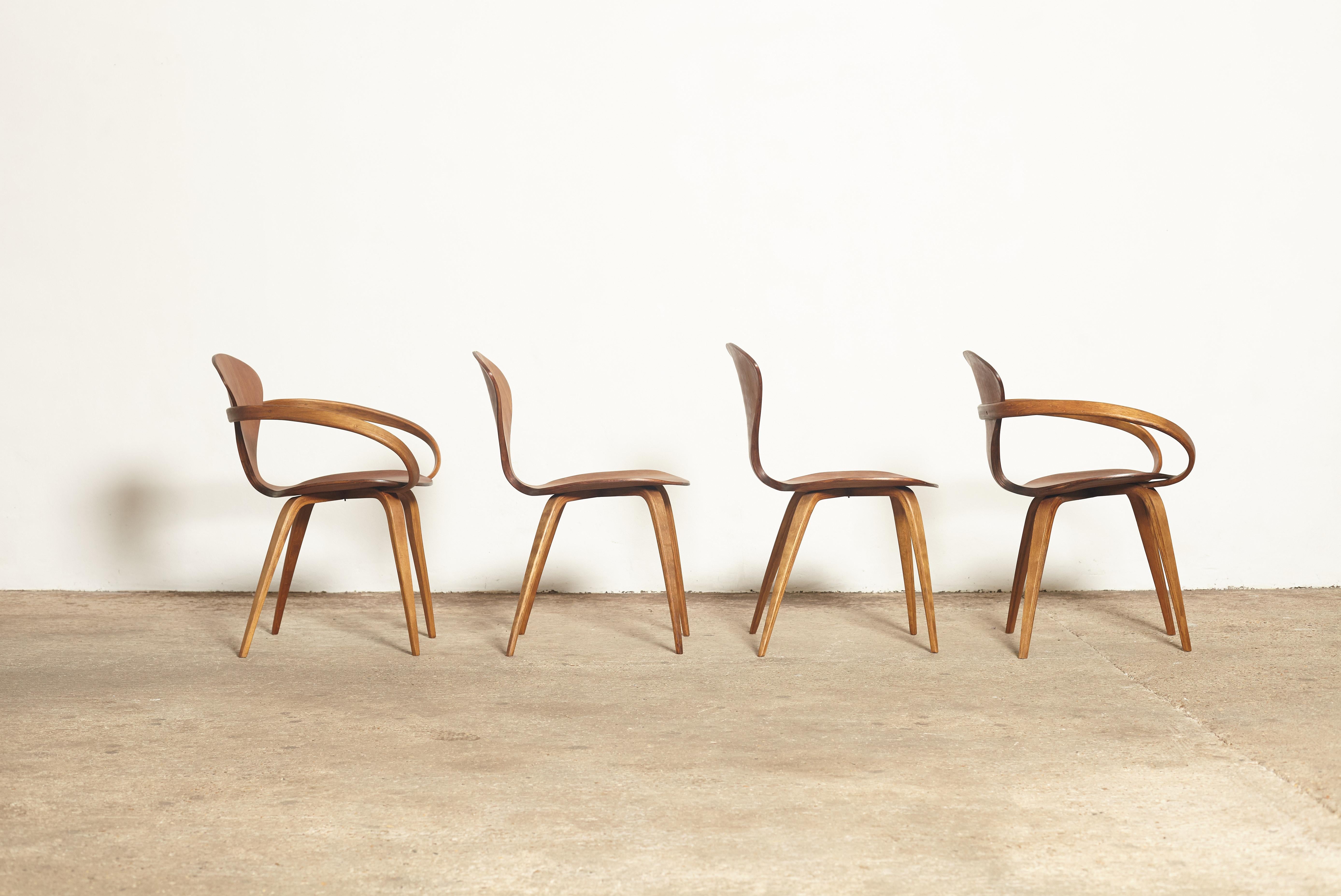 A set of four original Norman Cherner dining chairs, made by Plycraft, USA in the 1960s. Bentwood frames. Plycraft labels to the undersides of three of the chairs.