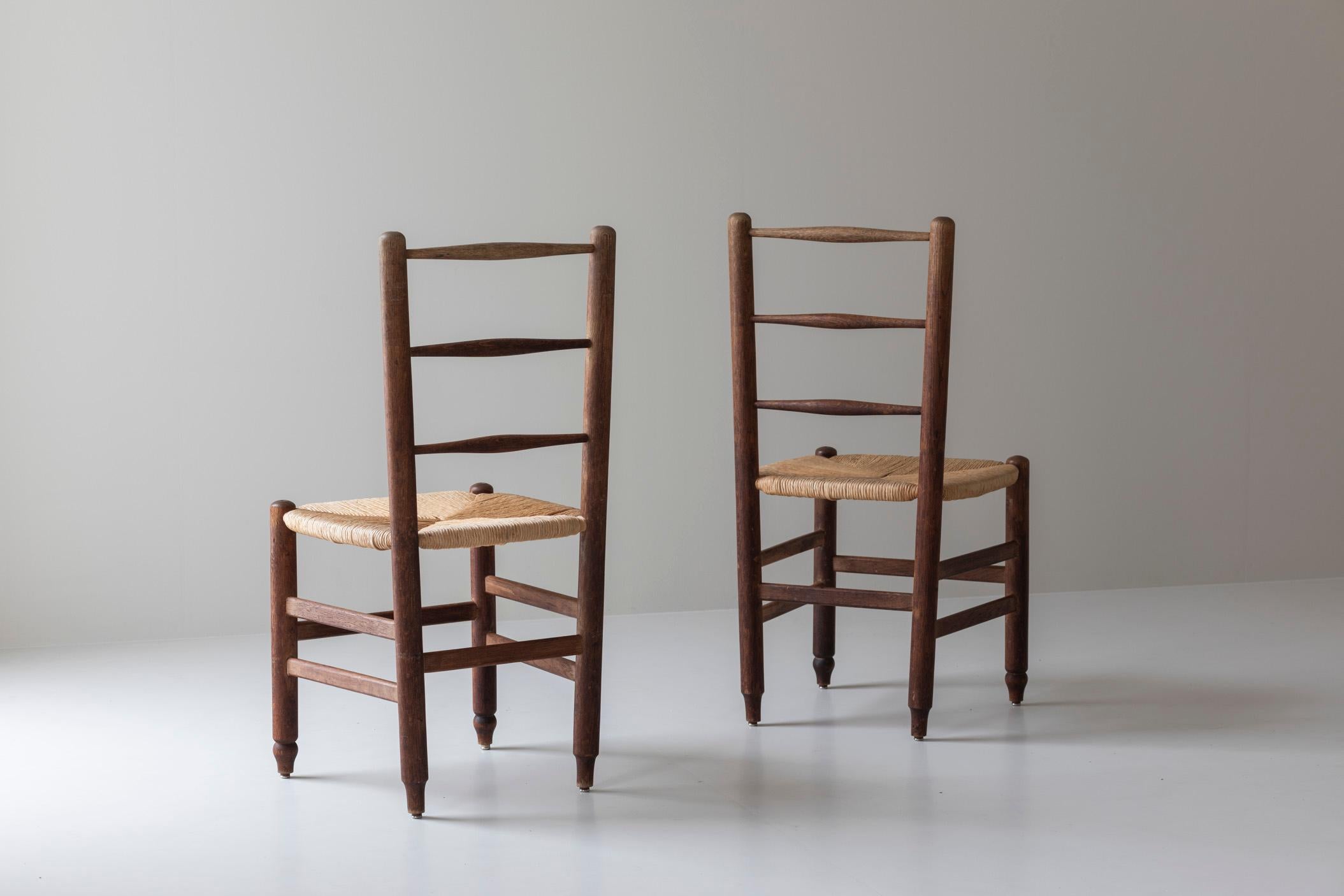 Metà XX secolo Set di quattro sedie da pranzo in Oak e paglia, Francia, anni '60. in vendita