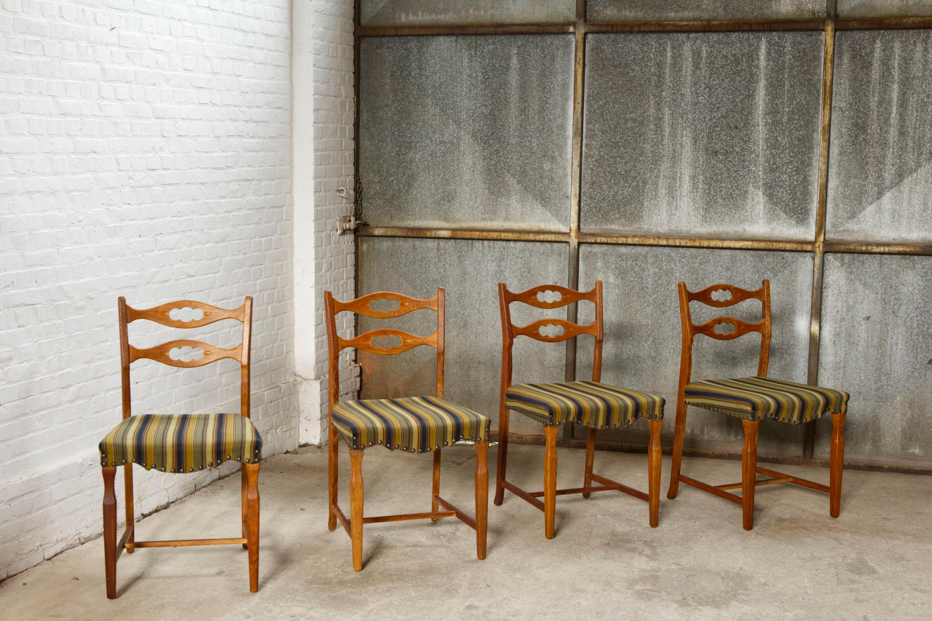 Set of four oak and wool dining room chairs by Henning Kjaernulf, 1960's For Sale 10