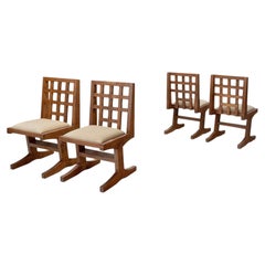 Set of Four Oak Dining Chairs with Geometric Backs, Europe Mid-20th Century