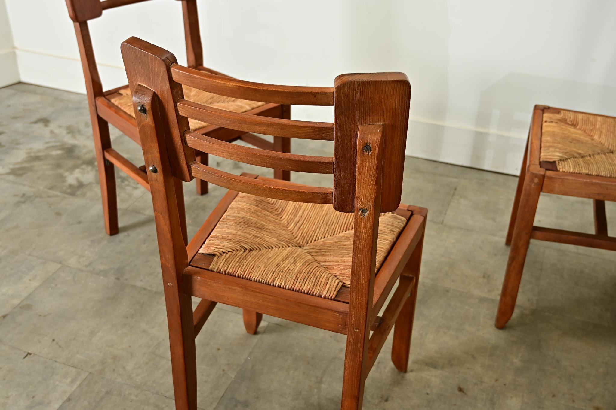 Set of Four Oak & Rush Seat Chairs by Cruege 11