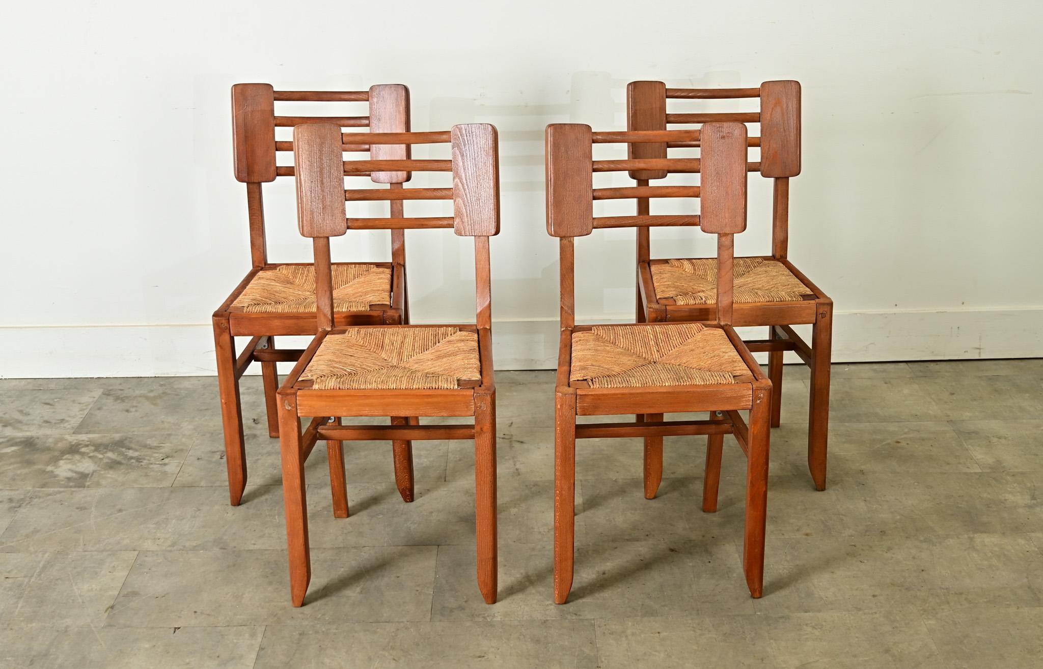 French Set of Four Oak & Rush Seat Chairs by Cruege