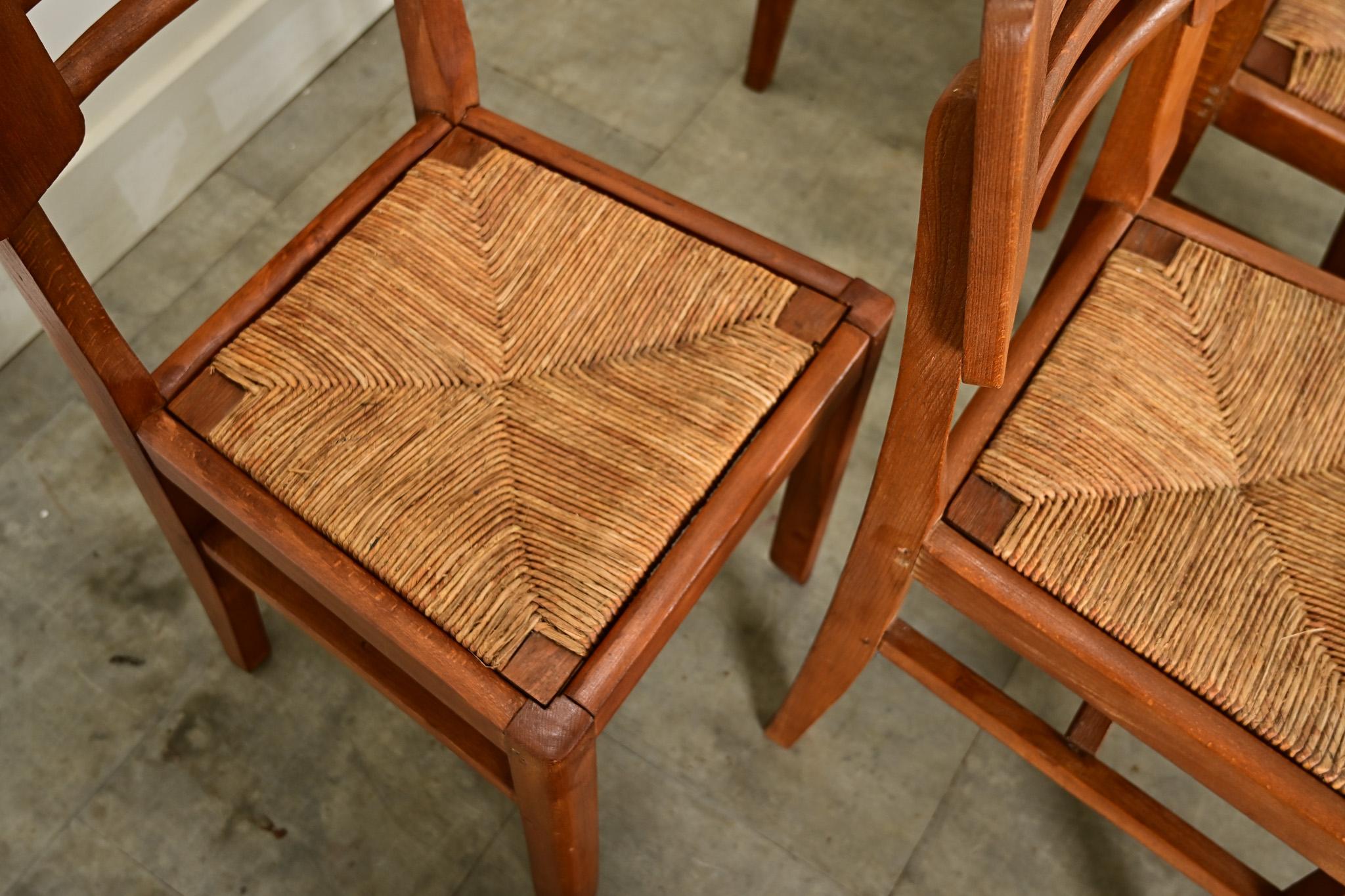 20th Century Set of Four Oak & Rush Seat Chairs by Cruege