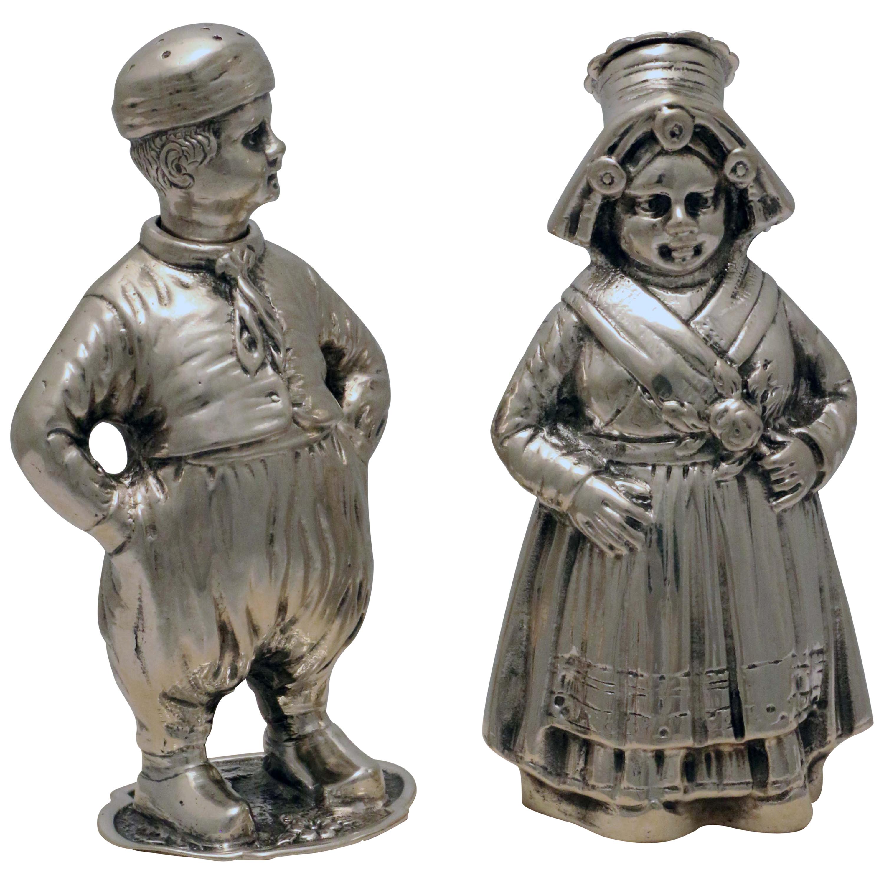 Set of Four of Dutch Silver Figural Salts and Peppers For Sale