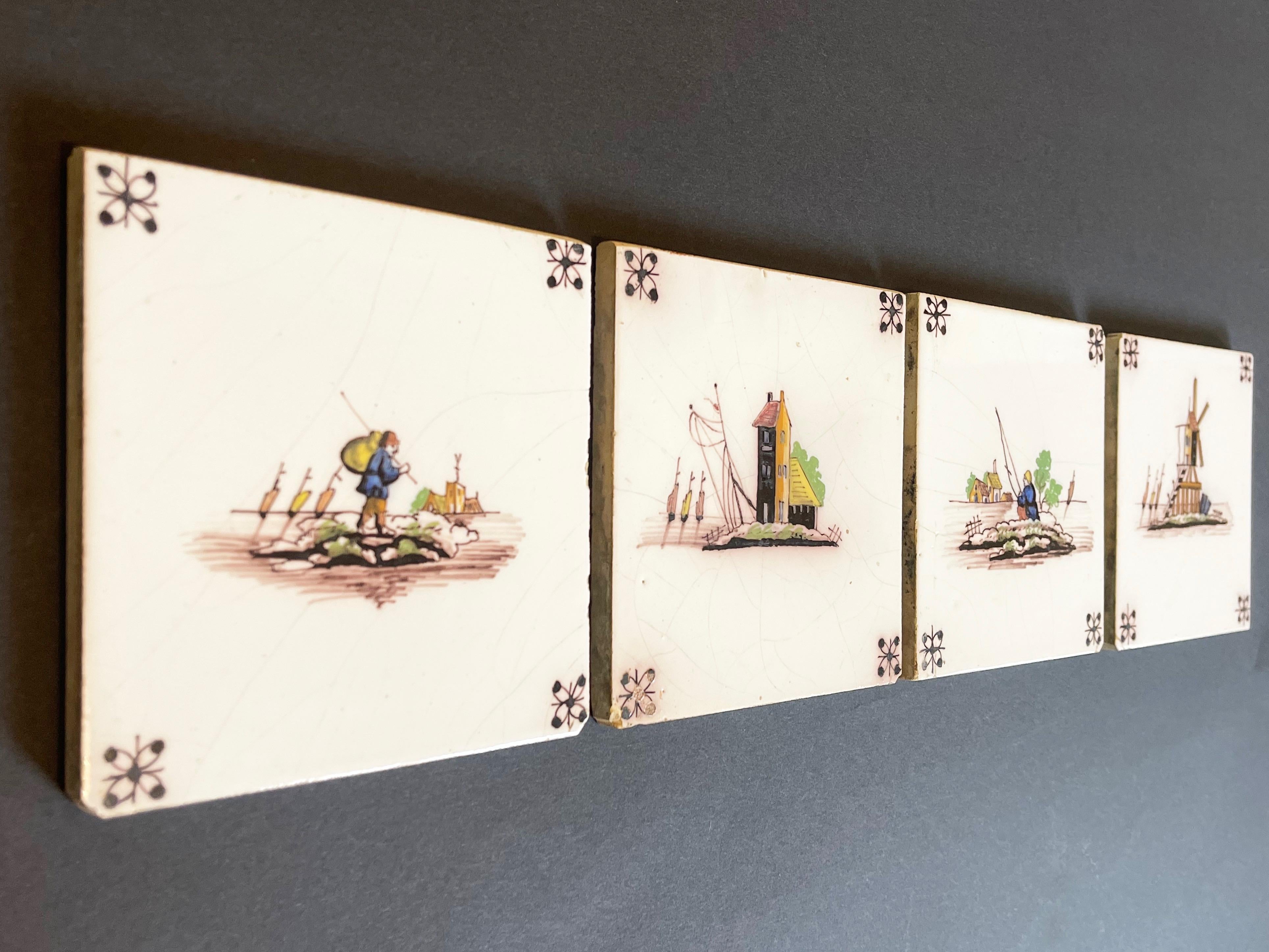 Four unusual and elegant Dutch Art Deco or slightly later ceramic tiles from the early 1920s to 1940s approx..

Genuine hand made and hand painted in a square shape, these tiles feature peasants and country scenes
such as a fisherman, a farmer