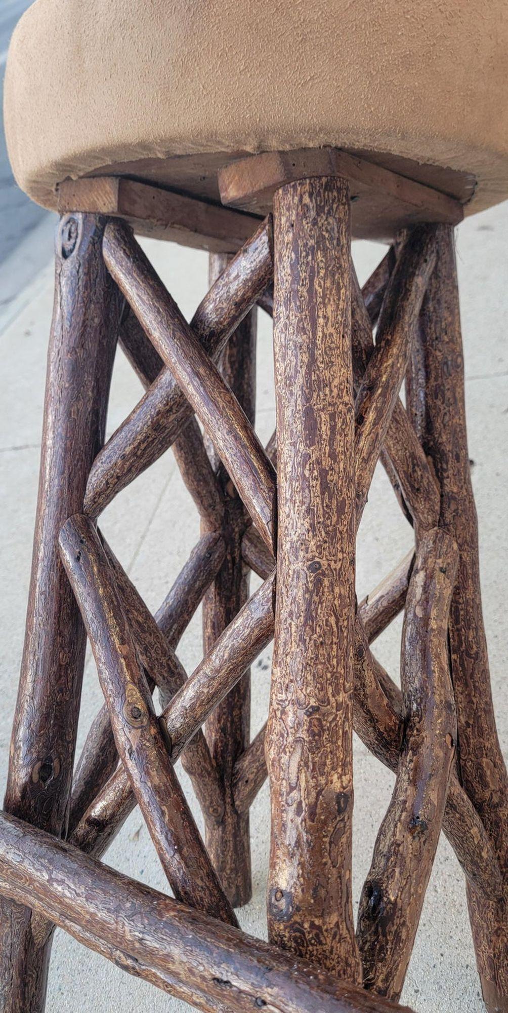 Collection of four, hand-made hickory stools with leather seat and soft inserts. 
In very sturdy condition.
They are priced as sets of four.
Seats can be upholstered in suede leather with a three-inch cushion.
