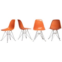 Vintage Set of Four Orange Eames DSR Chairs