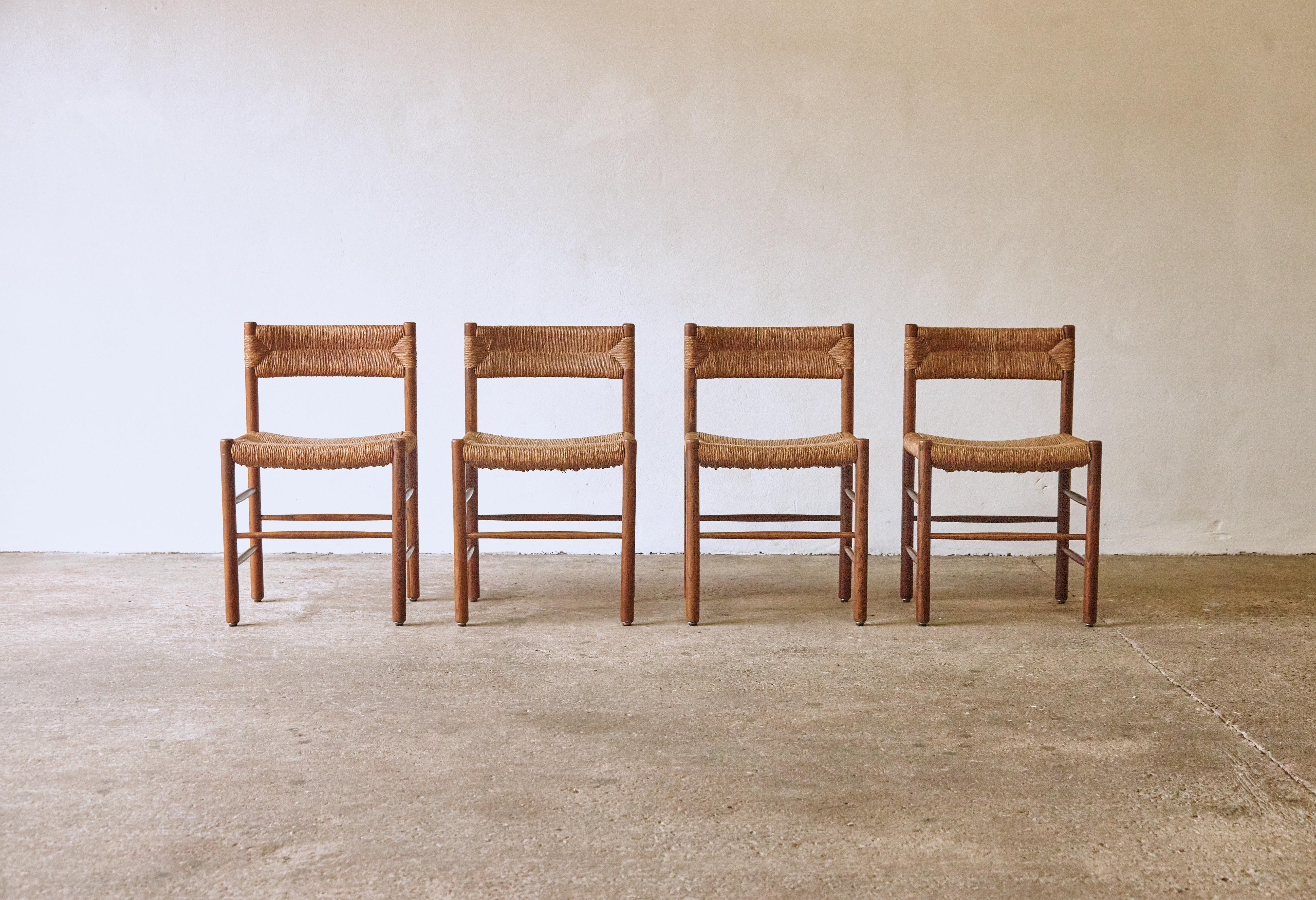 A set of four original Robert Sentou Dordogne chairs, this model often attributed to Charlotte Perriand, France, 1960s. Good structural condition, wooden frames in original condition with minor signs of use and wear relative to age. Original rush