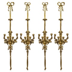 Set of Four Ormolu Wall Lights After a Model by Pierre Gouthiere