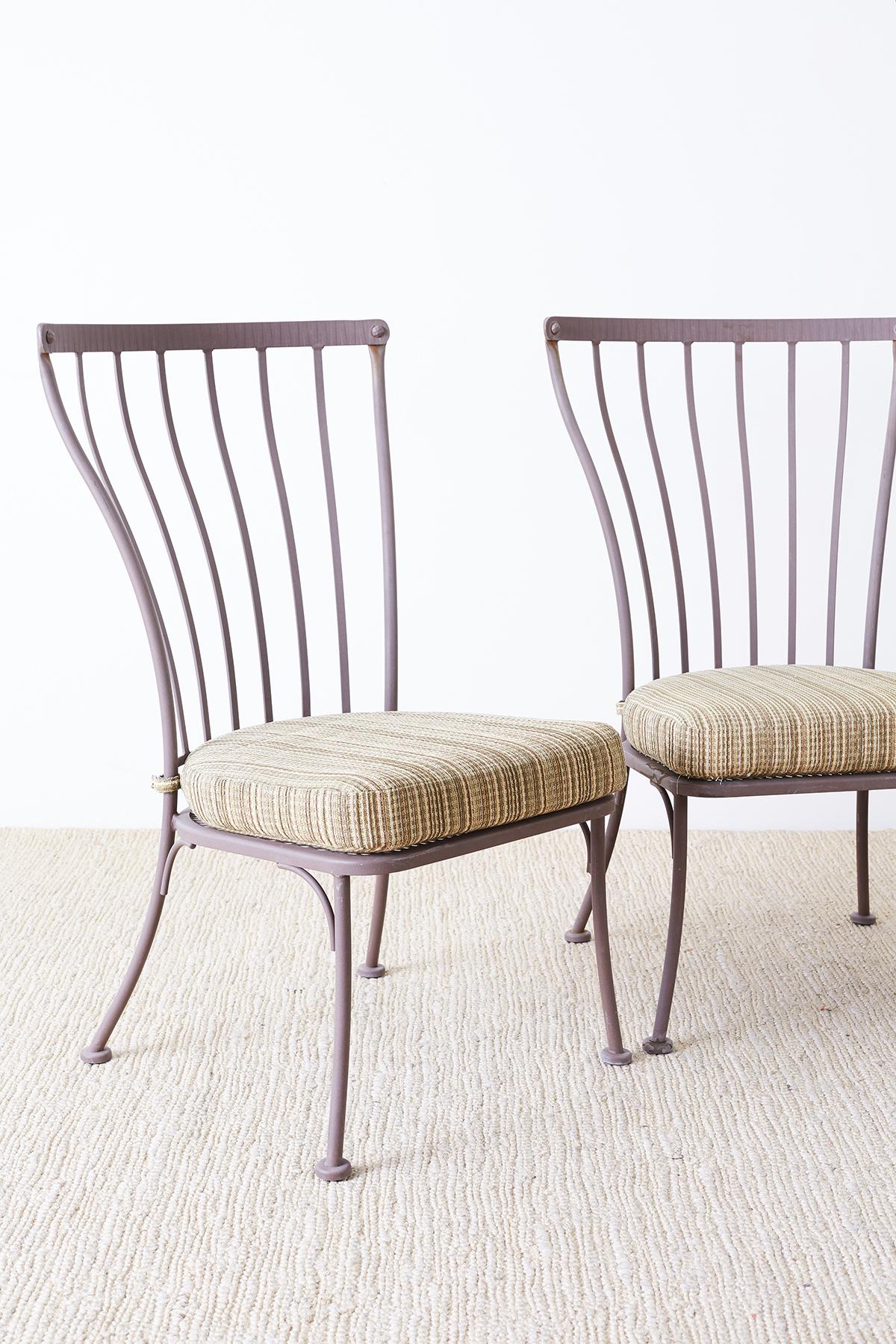 Large set of four patio garden dining chairs made by California artisans O.W. Lee Monterra collection which features hand-hammered finishes made from galvanized steel. Part of a large collection of O.W. Lee furniture from an estate in Pacific