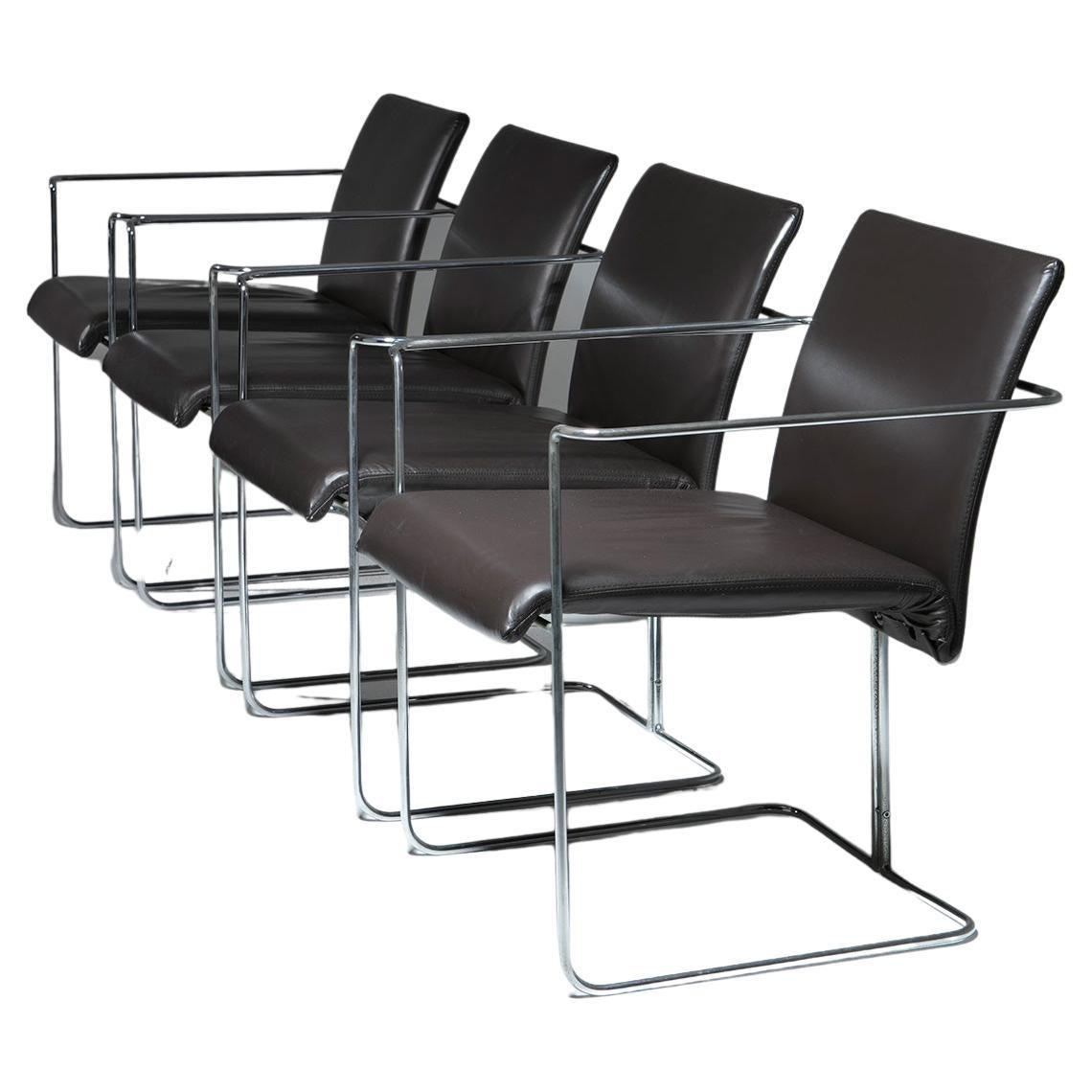 Set of four P15 arrmchairs by Ernesto Redaelli for Saporiti.
Steel frame supporting leather covered seating.