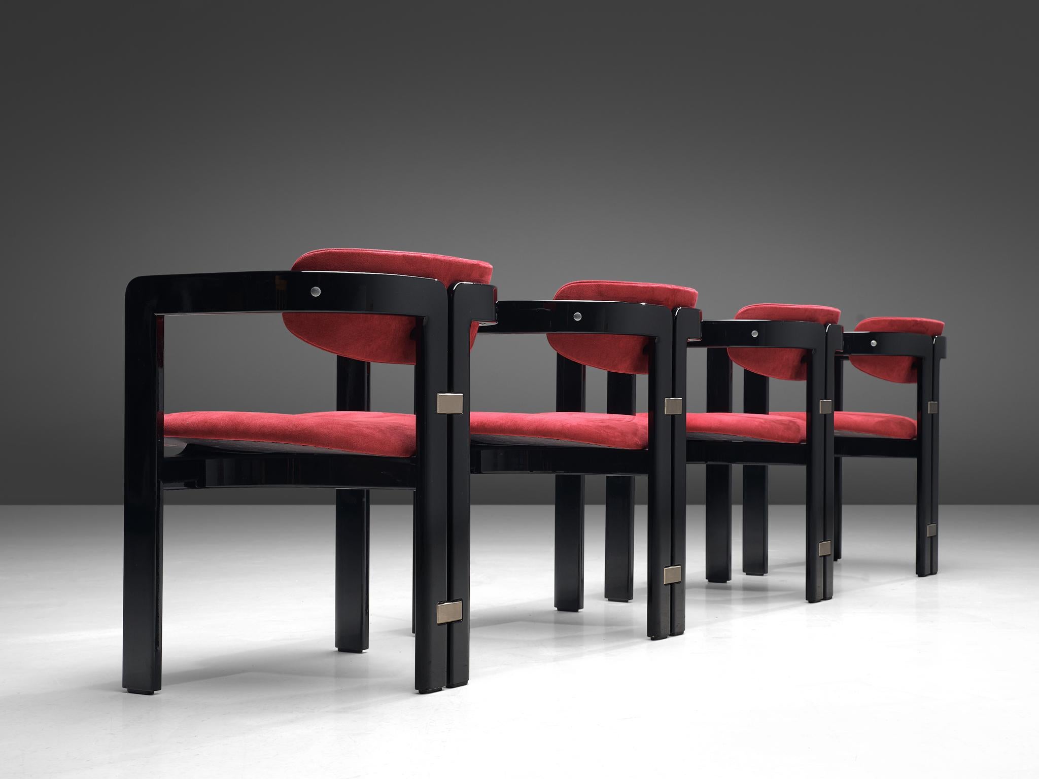 Augusto Savini, set of four 'Pamplona' dining room chairs, ebonized ashwood and red fabric, by for Pozzi, Italy, 1965.

Set of four armchairs in black lacquered ash and red suede inspired upholstery. A characteristic design; simplistic yet very