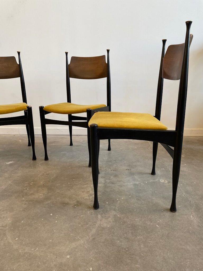 Set of four Paolo Buffa attributed set of four dining chairs. Newly reupholstered with curved plywood seat and backrest.