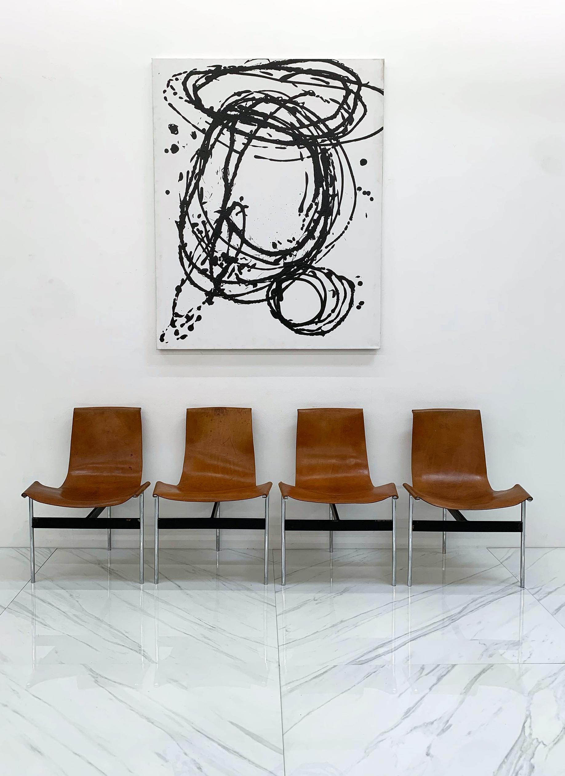 Available right now I have a set of 4 heavily patinated, buttery soft, oh-so stylish Katavolos, Kelley and Littell for Laverne, 1960s. These iconic chairs feature a black T bracket with polished steel legs, with a cognac leather sling seat. These