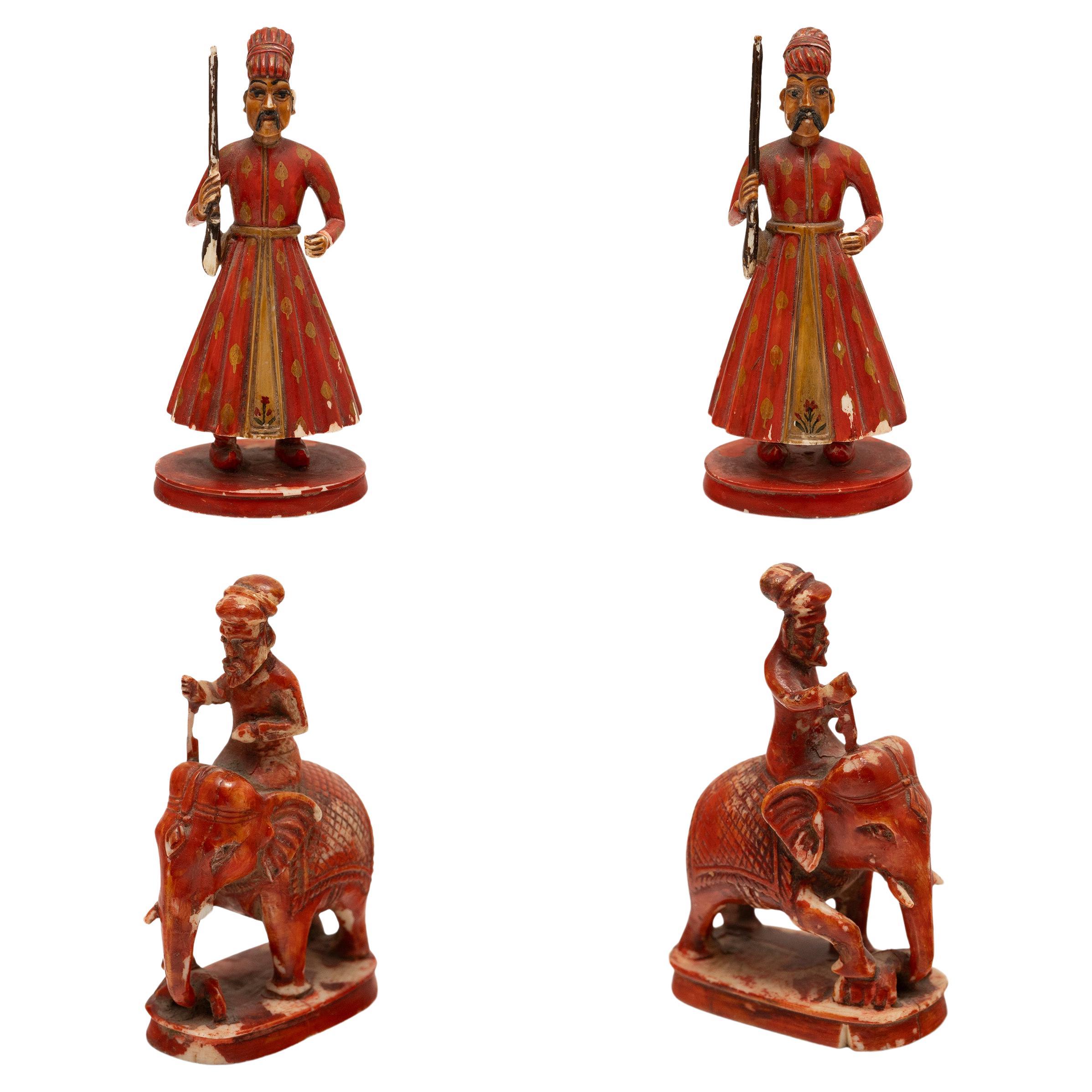 Set of Four Petite Bone Carvings of Indian Soldiers