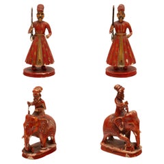 Set of Four Petite Bone Carvings of Indian Soldiers
