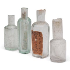 Set of Four Petite Glass Chinese Medicine Bottles