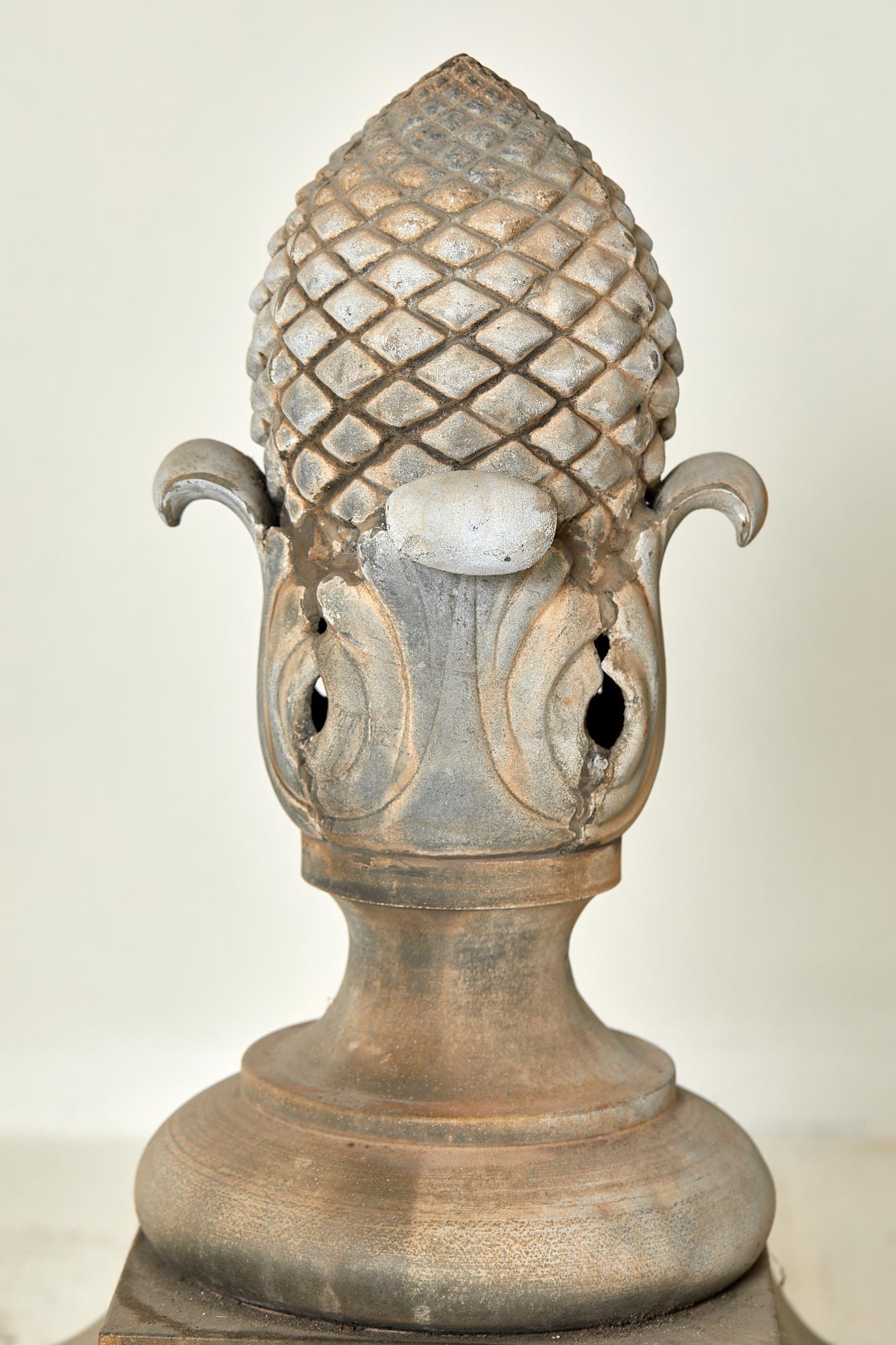 Zinc Set of four pine cone-shaped finials, zinc, circa 1990, France. For Sale