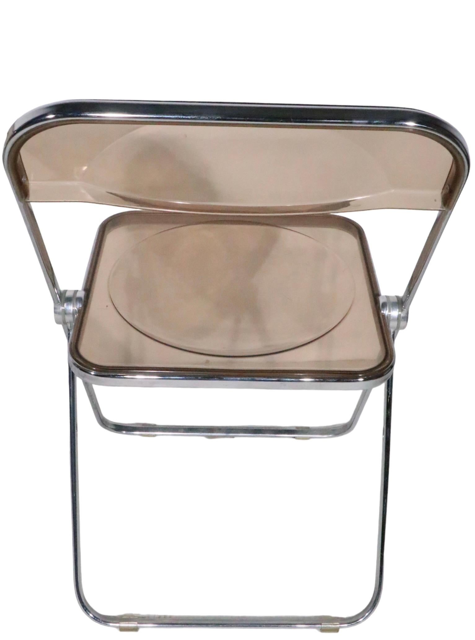 Chrome Ensemble de quatre chaises pliantes Plia de Giancarlo Piretti pour Castelli, vers les années 1970 en vente