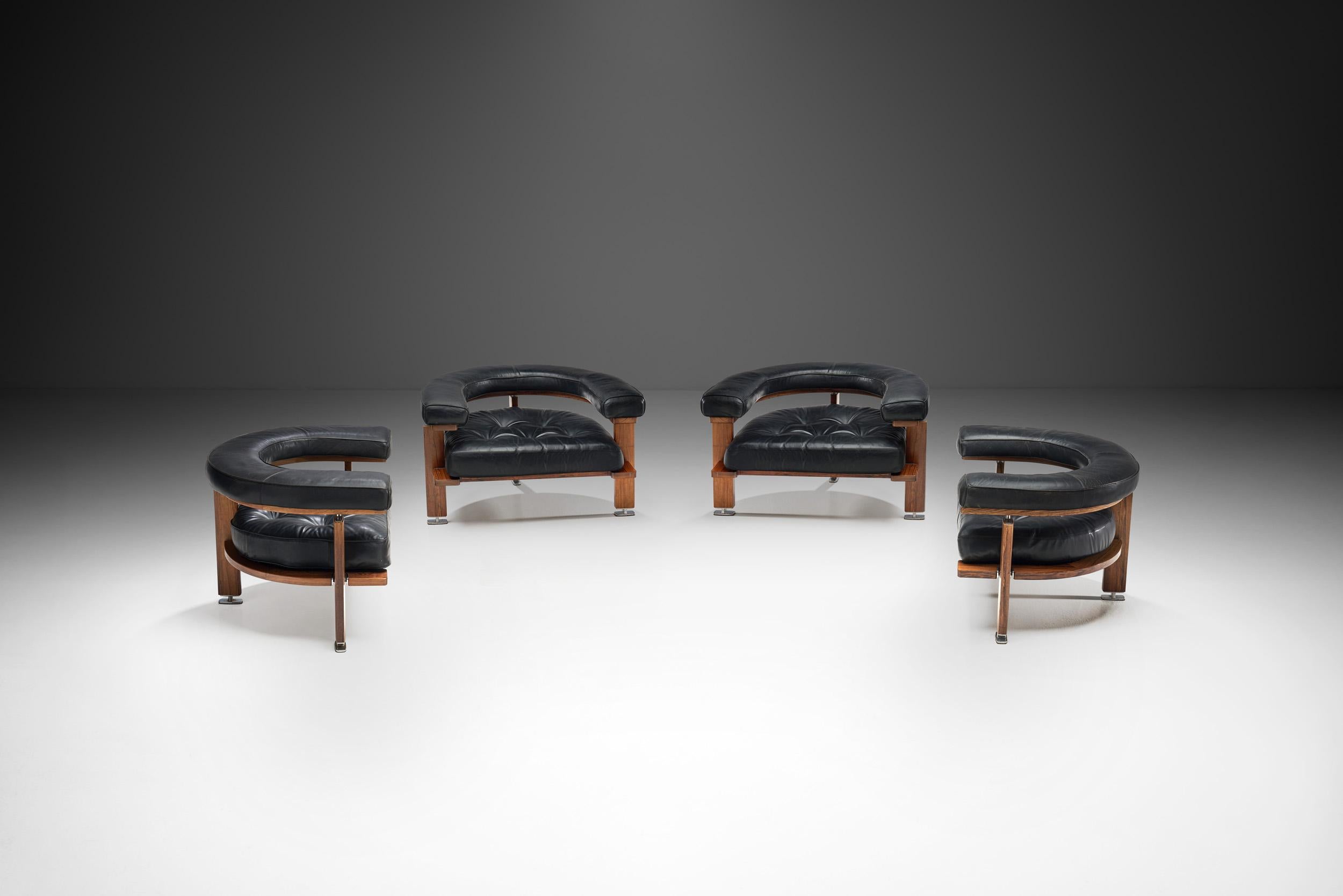 This set of four of “Polar” lounge chairs was designed by the eminent Finnish designer, Esko Pajamies, and produced by Lahden Lepokalusto Oy Finland during the 1960s.

These leather chairs feature a half moon shaped backrest and comfortable,