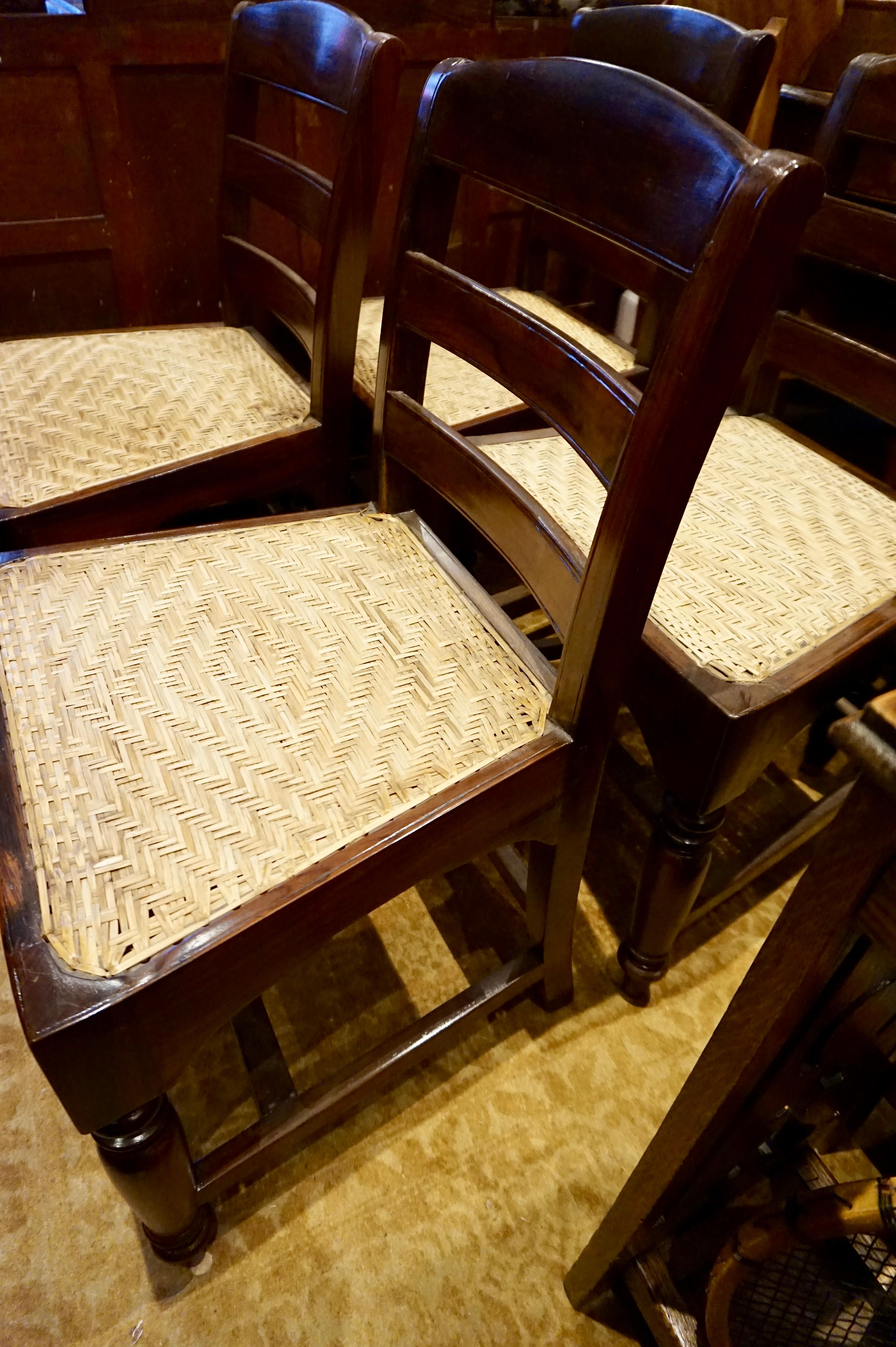 Set of Four Portuguese Rosewood Chairs with Woven Rattan Cane Seats In Good Condition In Vancouver, British Columbia