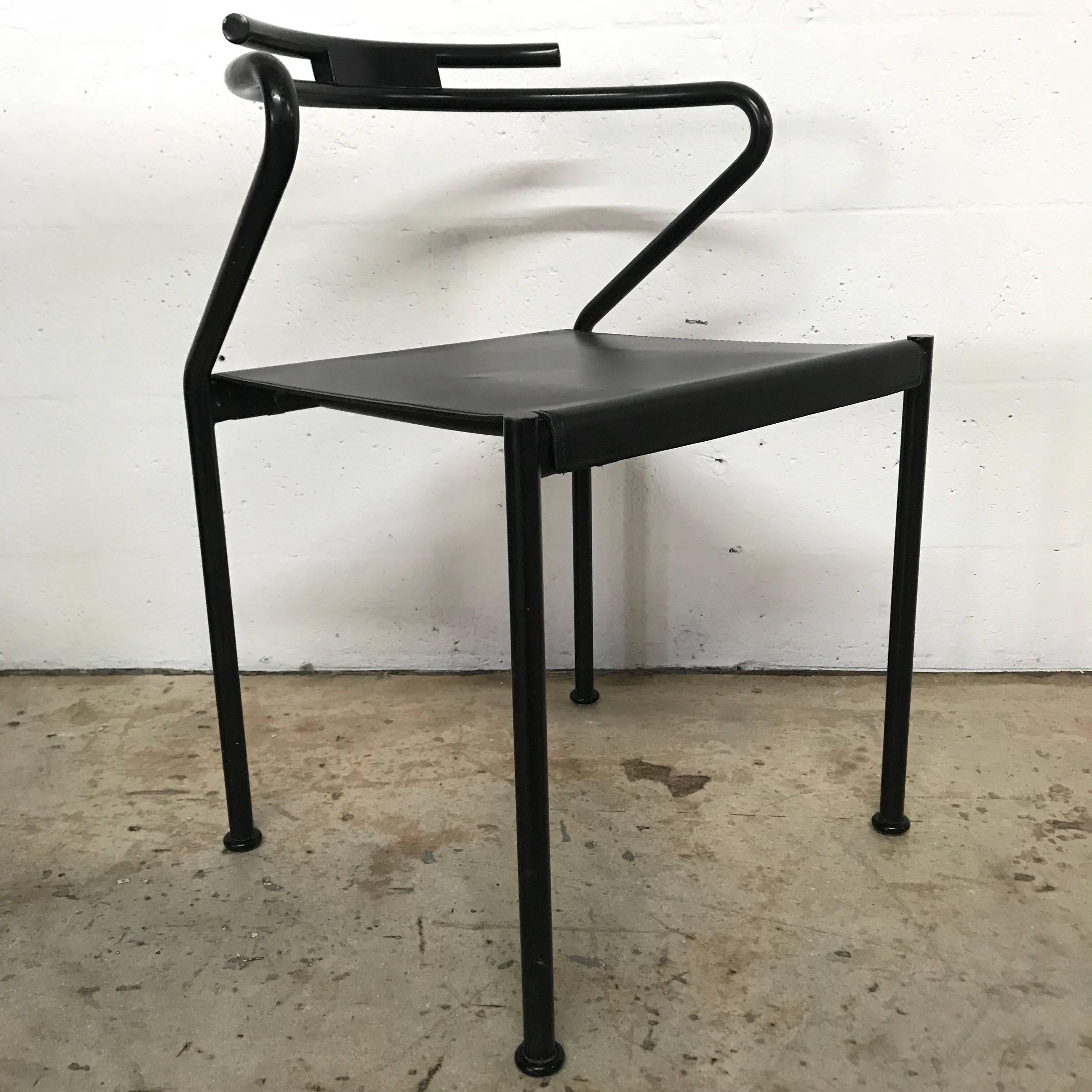 Post modern dining chairs in black metal with stitched leather seat