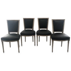 Set of Four Pretty Carved and Painted Louis XVI Chairs with Black Leather Seats