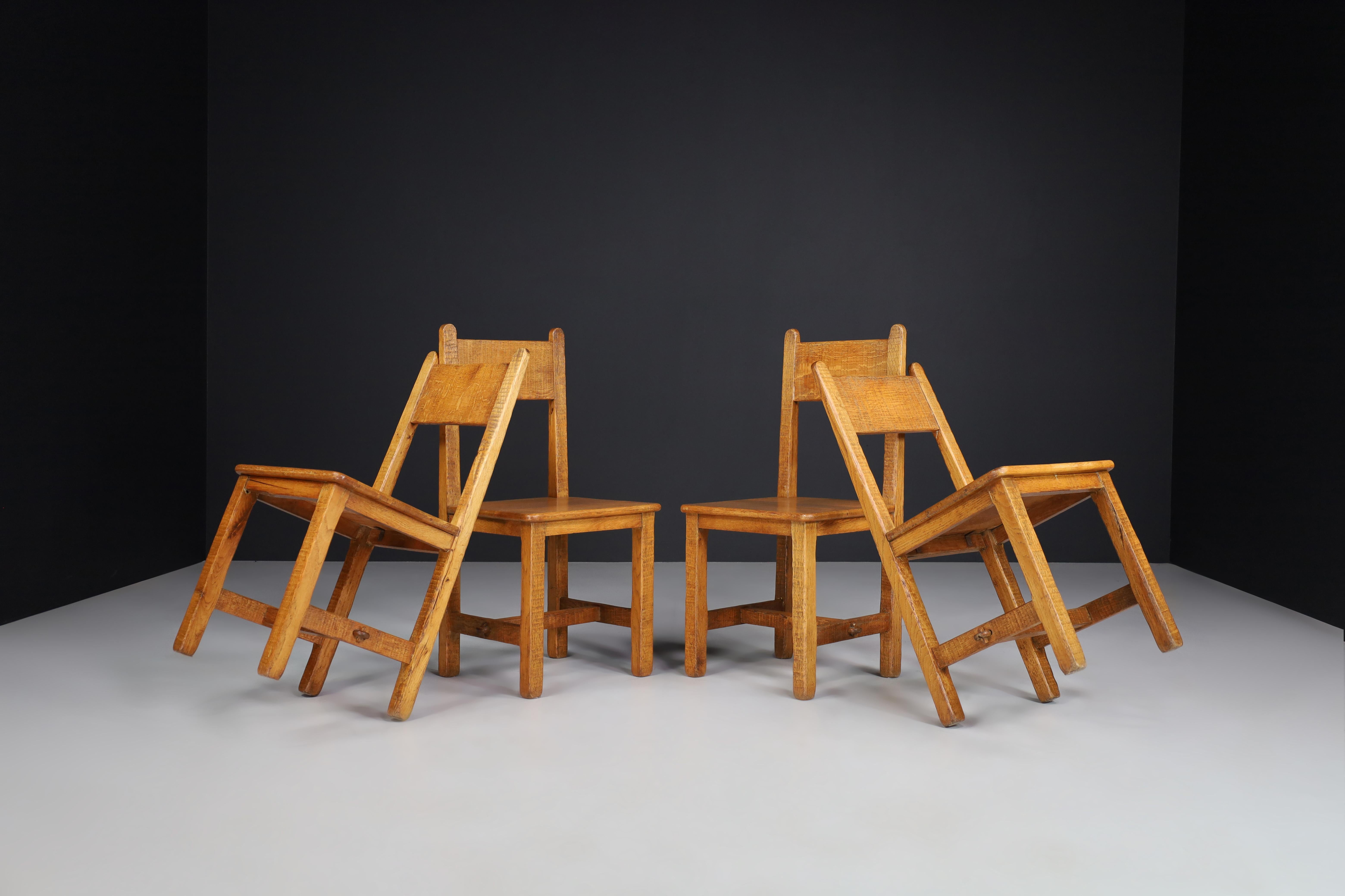 Set of Four Primitive Chairs in Patinated Oak, France, 1950s For Sale 5