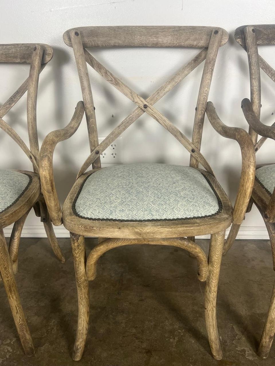 Set of Four Primitive Dining Chairs w/ Linen Seats In Distressed Condition For Sale In Los Angeles, CA