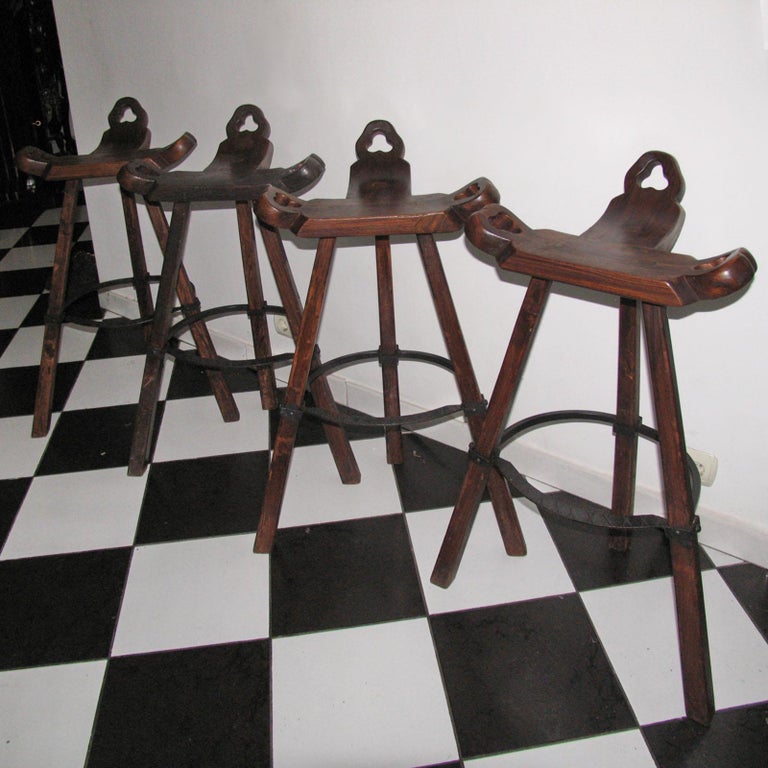 Wrought Iron Set of Four Primitive Tripod Bar Stools For Sale