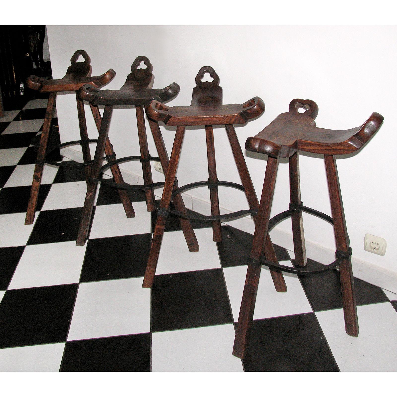 Wrought Iron Set of Four Primitive Tripod Bar Stools