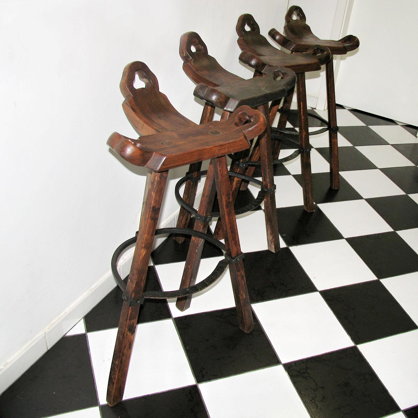 Set of Four Primitive Tripod Bar Stools 1