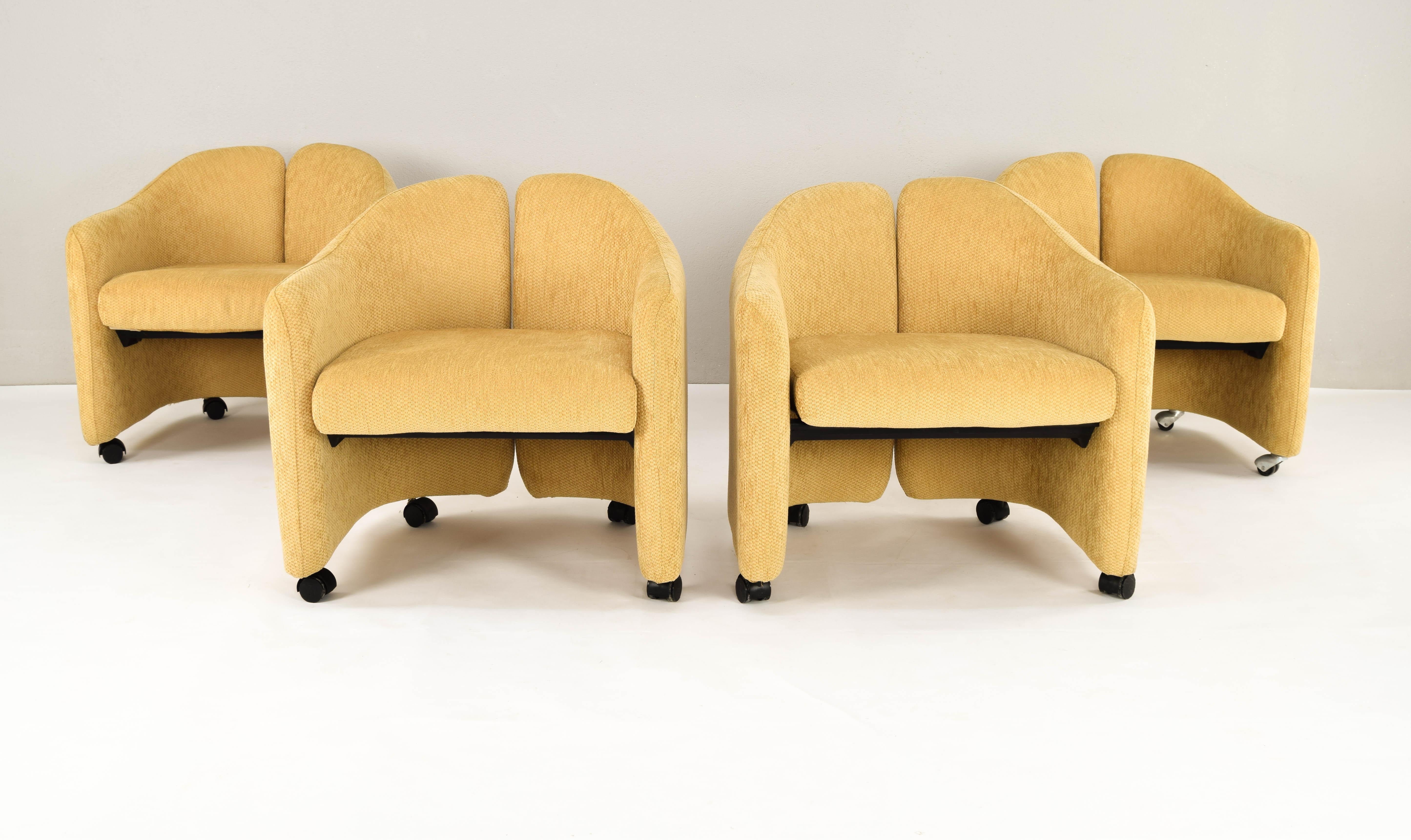 Armchairs designed by Eugenio Gerli for Tecno Italia and manufactured in Spain under license from the Martinez Medina company in cream color. Metallic structure, padded in polyurethane foam, covered with a beautiful beige wool upholstery in an