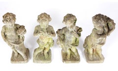 Set of Four Putti Garden Statues