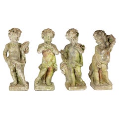 Antique Set of Four Putti Garden Statues