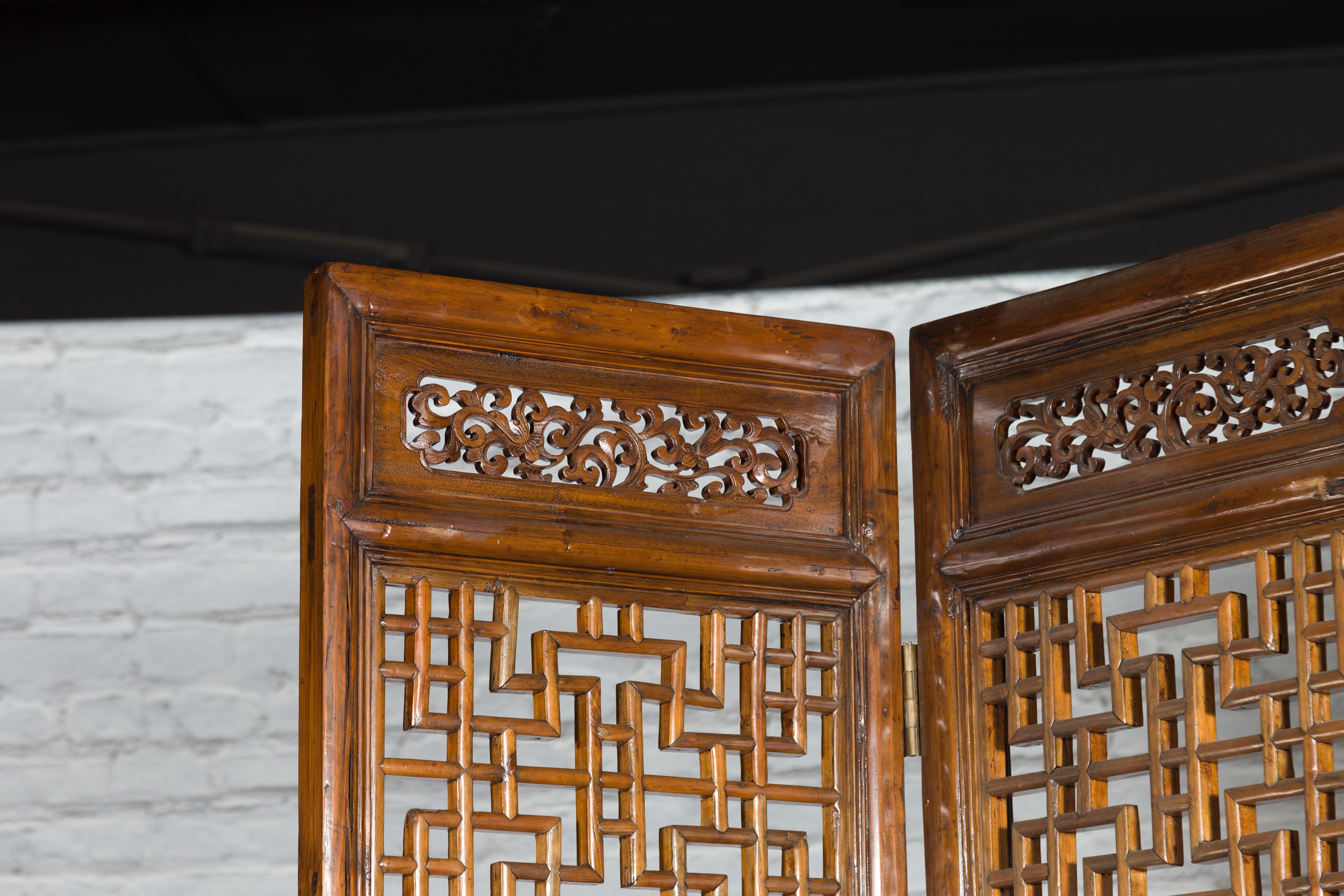 19th Century Set of Four Qing Dynasty Elmwood Open Fretwork Panels with Delicate Carvings For Sale