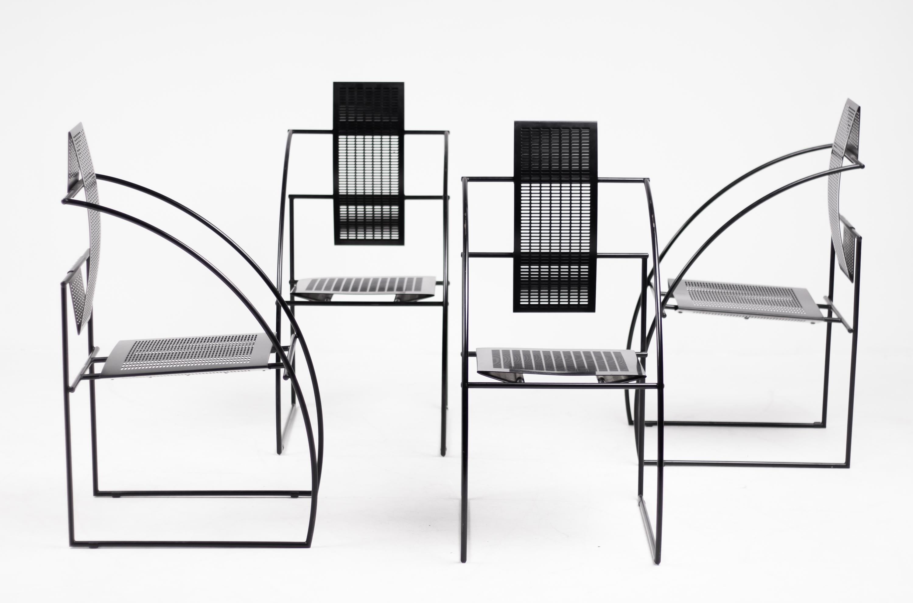 Set of four Quinta chairs by the Italian architect Mario Botta for Alias.
The Quinta chair is constructed with steel rod frame and folded perforated sheet metal seat and back.
Designed in 1985, marked with label.