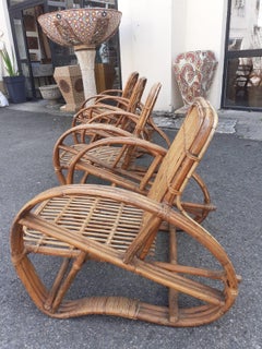 Set of four rattan armchairs