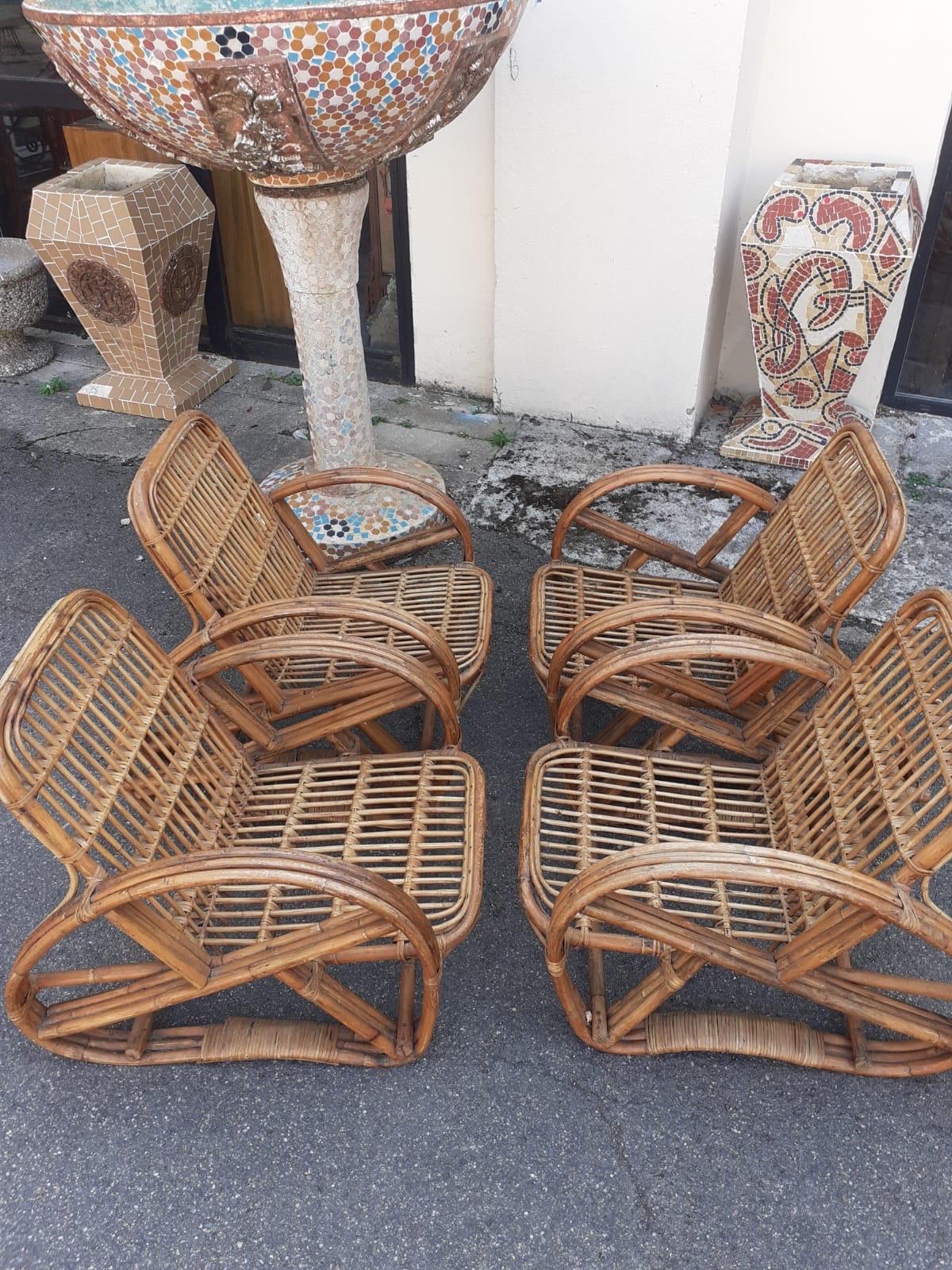 Set of four rattan armchairs In Good Condition For Sale In Saint-Ouen, FR