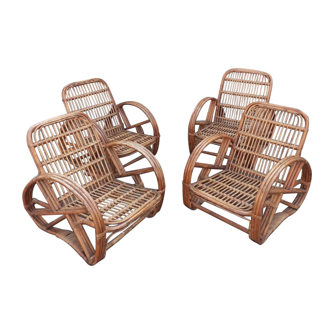 Set di quattro poltrone in rattan in vendita