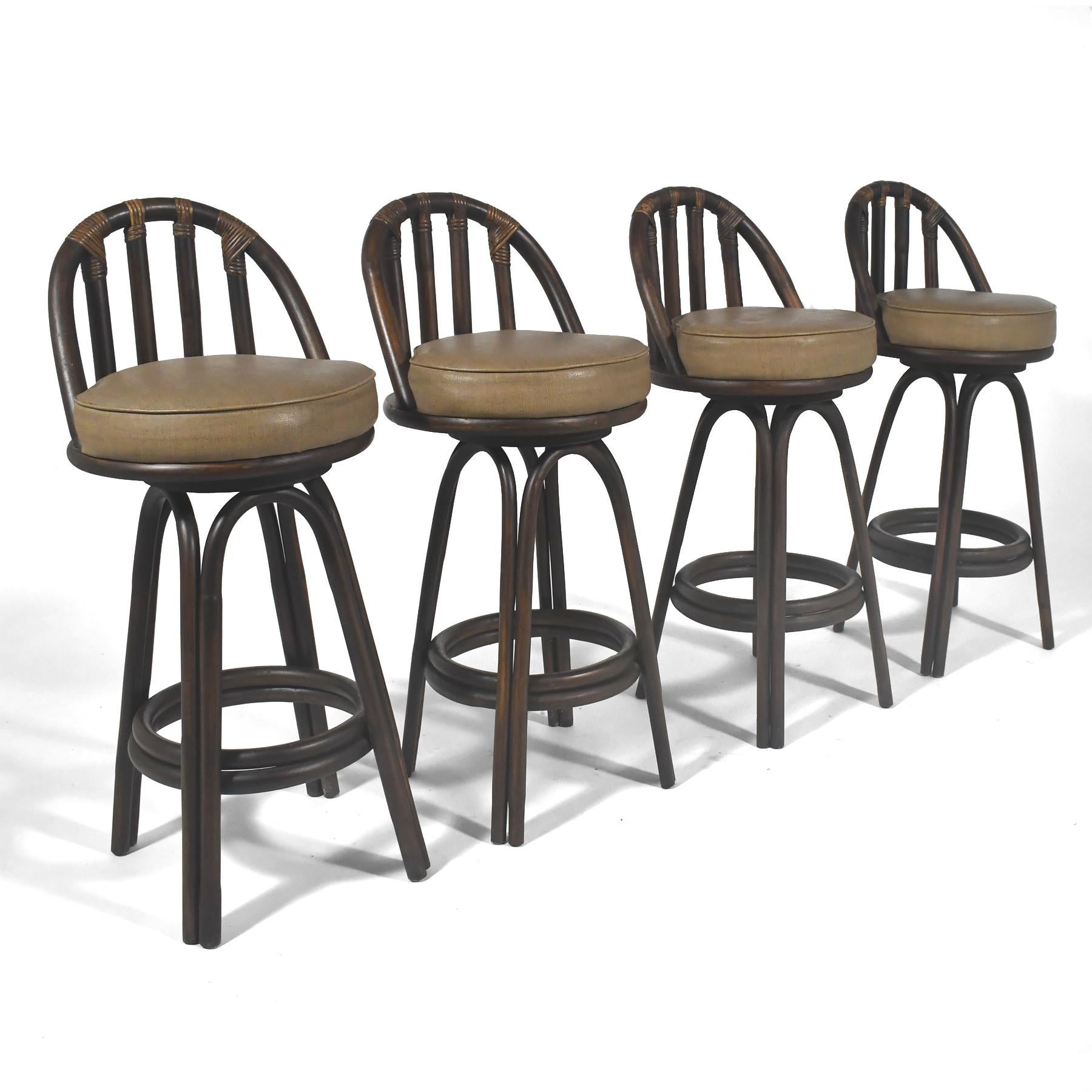 These four bars stools have a terrific organic modern design– the rattan frames are finished in a rich, dark maduro tobacco color with upholstered seats that have swivel function.


39