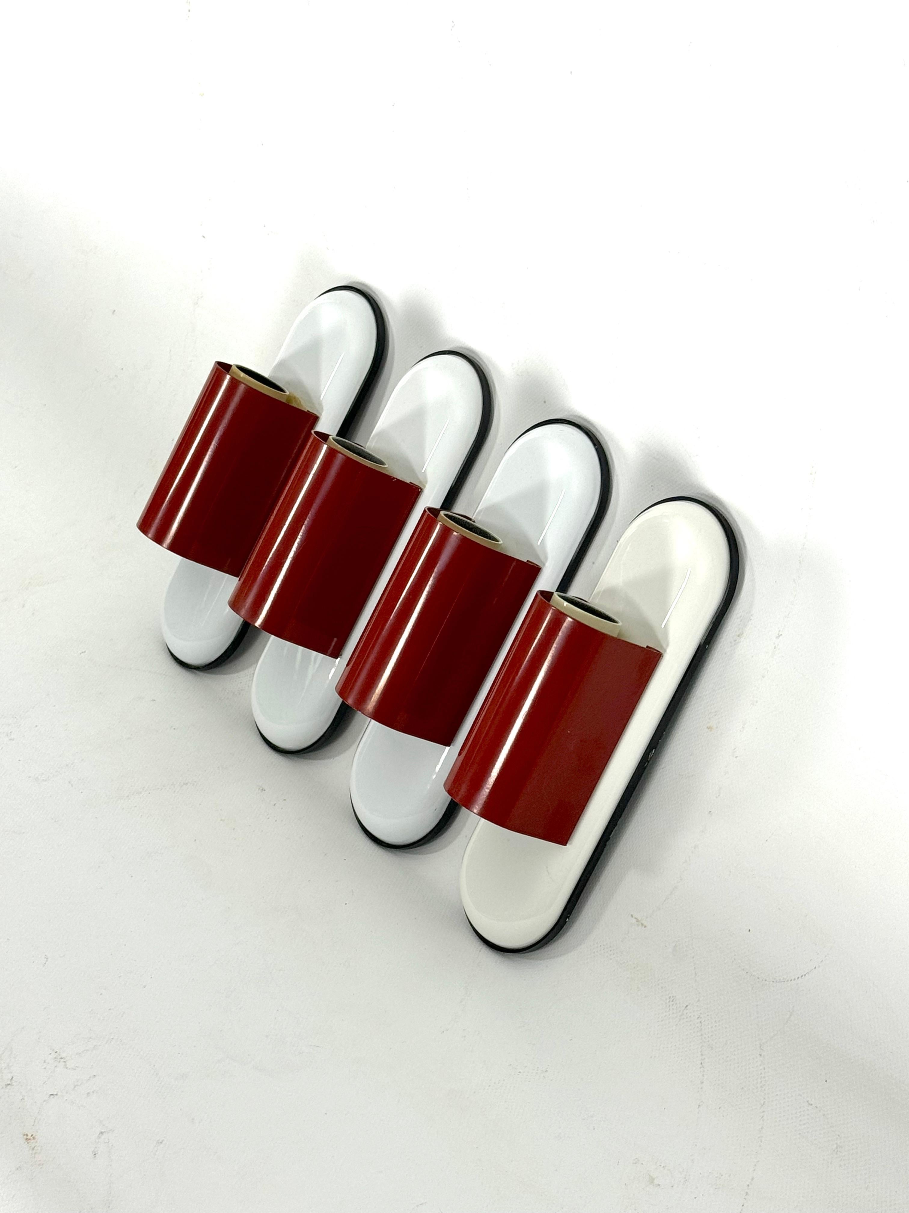 Mid-Century Modern Set of four red Dui sconces by Vico Magistretti for Artemide. Italy 1970s For Sale