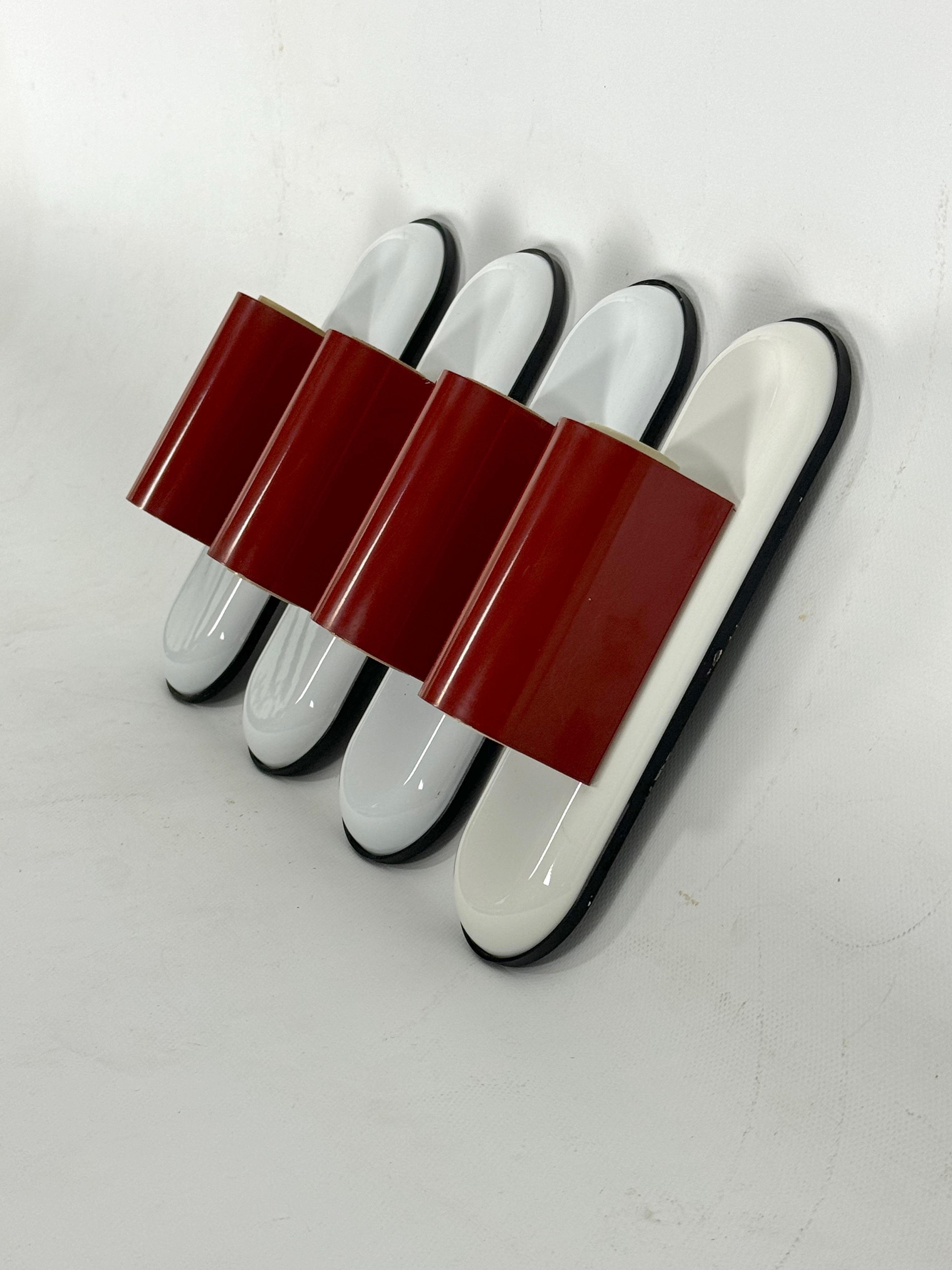 Italian Set of four red Dui sconces by Vico Magistretti for Artemide. Italy 1970s For Sale